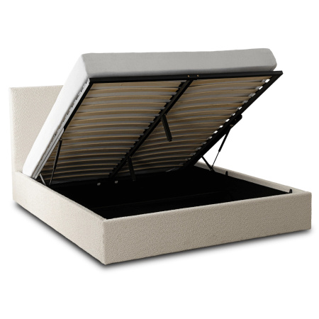 Łóżko tapicerowane 160x200 na nóżkach beżowe z zagłówkiem i stelażem.